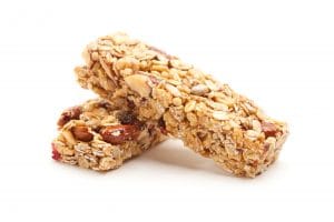 Two Nutritious Granola Bars Isolated on White with narrow Depth of Field.